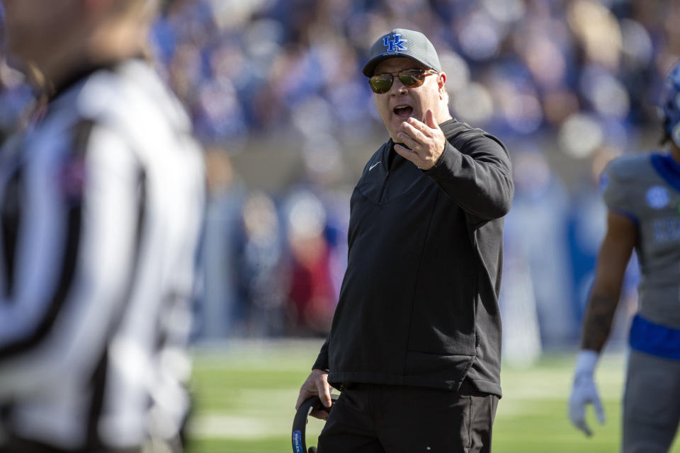 Kentucky head coach Mark Stoops yells at the referee during the first half of an NCAA college football game against Alabama in Lexington, Ky., Saturday, Nov. 11, 2023. (AP Photo/Michelle Haas Hutchins)