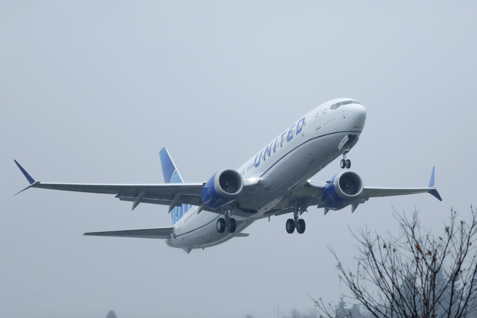 FILE - In this Dec. 11, 2019, file photo a United Airlines Boeing 737 Max airplane takes off in the rain at Renton Municipal Airport in Renton, Wash. United Airlines says the Boeing 737 Max has been pulled from its flight schedule until June, the latest in a string of troubling news plaguing the airplane manufacturer. (AP Photo/Ted S. Warren, File)