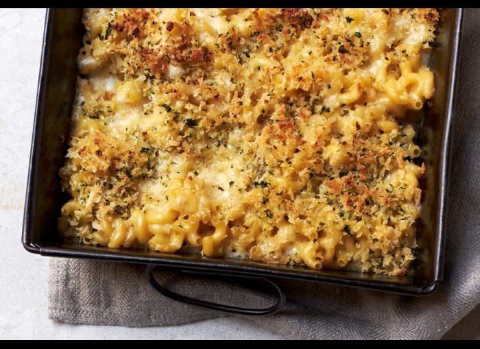 SERVINGS: 8   ACTIVE: 30 MINUTES   TOTAL: 1 HOURS    INGREDIENTS  1/2 cup (1 stick) unsalted butter, divided  1/4 cup all-purpose flour  3 cups whole milk  1 tablespoon kosher salt plus more  1/2 teaspoon freshly ground black pepper plus more  1 pound elbow macaroni  2 cups shredded cheddar, divided  2 garlic cloves, chopped  1 cup panko (Japanese breadcrumbs)  2 tablespoons chopped flat-leaf parsley    <strong>PREPARATION  </strong>Preheat oven to 400°. Melt 1/4 cup butter in a large saucepan over medium-high heat. Add flour; cook, whisking constantly, for 1 minute. Whisk in milk and 3 cups water. Bring to a boil, reduce heat to a simmer, and cook, whisking often, until a very thin, glossy sauce forms, about 10 minutes. Stir in 1 tablespoon salt and 1/2 teaspoon pepper. Remove sauce from heat. Toss pasta and 1 1/2 cups cheese in a 13x9x2-inch or other shallow 3-quart baking dish. Pour sauce over (pasta should be submerged; do not stir) and cover with foil. Bake until pasta is almost tender, about 20 minutes.  Meanwhile, melt remaining 1/4 cup butter in a large skillet over medium heat. Add garlic, panko, and parsley and toss to combine. Season with salt and pepper.  Remove foil from dish. Sprinkle with remaining 1/2 cup cheese, then panko mixture. Bake until pasta is tender, edges are bubbling, and top is golden brown, about 10 minutes longer. Let sit 10 minutes before serving.    <a href="http://www.bonappetit.com/recipes/slideshow/recipes-everyone-should-know-how-to-cook/?slide=12?MBID=SYND_HUFFPO" target="_hplink">FOR THE REST OF THE RECIPES YOU SHOULD KNOW HOW TO MAKE, VISIT BON APPETIT.COM  </a>  <em>  Photo by Christina Holmes</em>