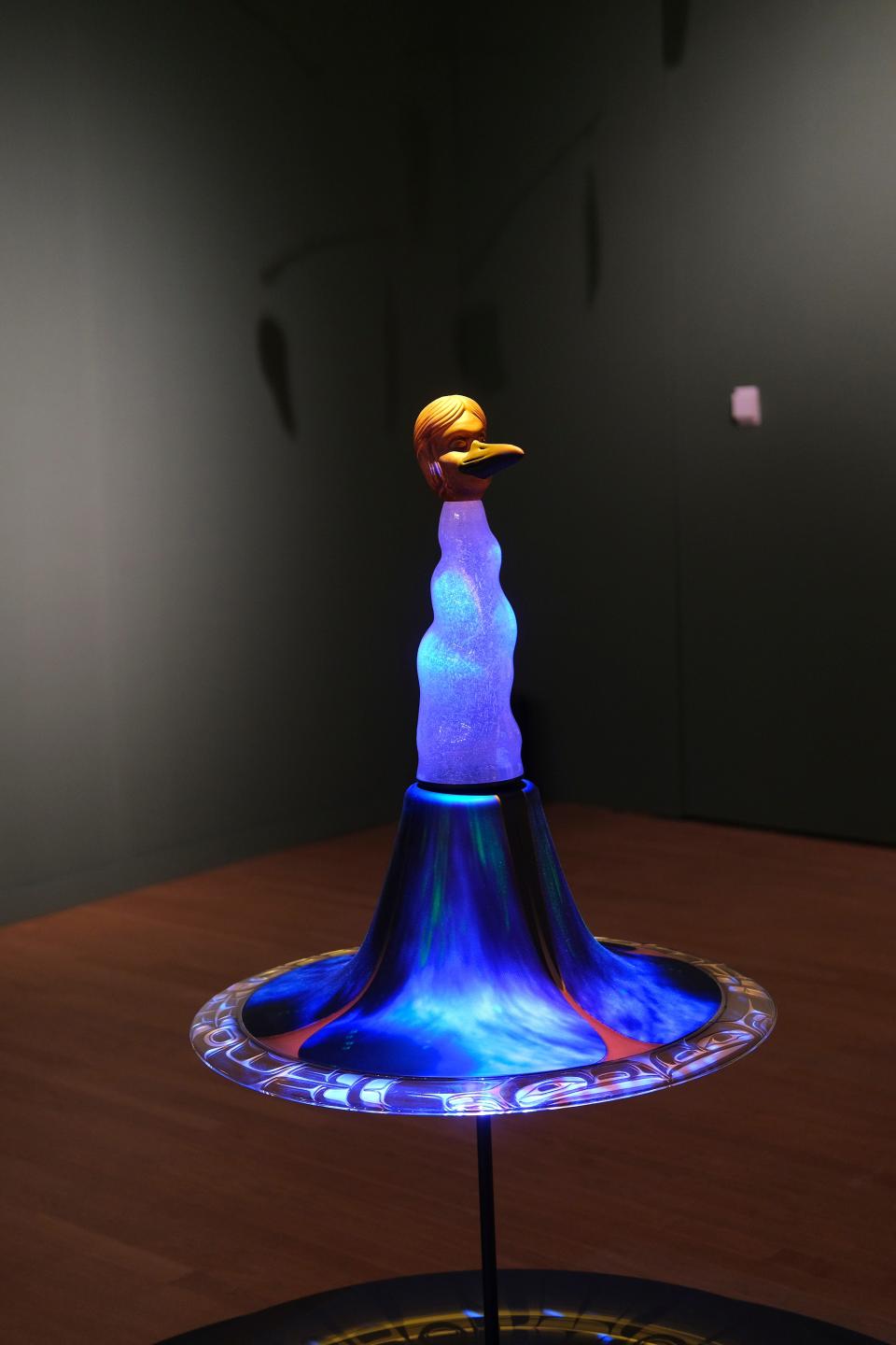 The 2018 piece "Yeil Koowditee (Raven Birth), which combines blown, hot-sculpted and sand-carved glass with video projections, is displayed Thursday, Nov. 9, 2023, in the Oklahoma City Museum of Art exhibit "Preston Singletary: Raven and the Box of Daylight." The multi-sensory experience combines glass, video, and audio to tell the story of Raven, a creator figure in Tlingit culture.