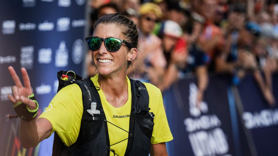  US trailer Courtney Dauwalter celebrates as she crosses the finish line to win the 20th edition of The Ultra Trail du Mont Blanc. 