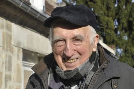 Jean Vanier, poses outside his home in Trosly-Breuil, in this picture taken March 7, 2015. Vanier, a Canadian who launched an international network of communities for the mentally disabled, has won the 2015 Templeton Prize worth $1.7 million for affirming life's spiritual dimension March 11, 2015. REUTERS/Tom Heneghan