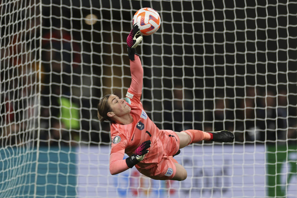 England's goalkeeper Mary Earps attempts a save during a penalty shootout at the end of the Women's Finalissima soccer match between England and Brazil at Wembley stadium in London, Thursday, April 6, 2023. (AP Photo/Ian Walton)