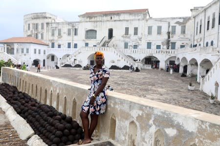 Charity Butler Agyemang, a Ghananian tour guide looks on at the Cape Coast Slave Castle in Ghana