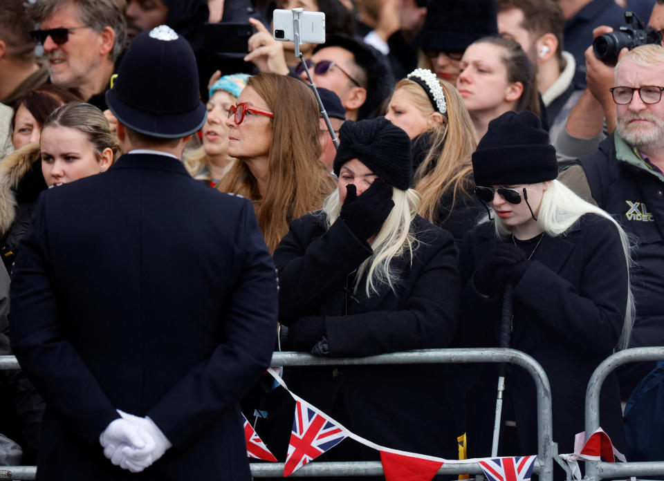 Members of the public are emotional during the State Funeral of Queen Elizabeth II, held at Westminster Abbey, London. Picture date: Monday September 19, 2022.