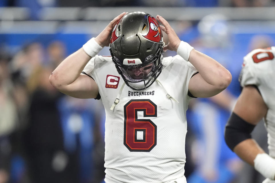 Tampa Bay Buccaneers quarterback Baker Mayfield (6) walks to the bench after a pass by Mayfield was intercepted by the Detroit Lions during the second half of an NFL football NFC divisional playoff game, Sunday, Jan. 21, 2024, in Detroit. The Lions won 31-23. (AP Photo/Carlos Osorio)