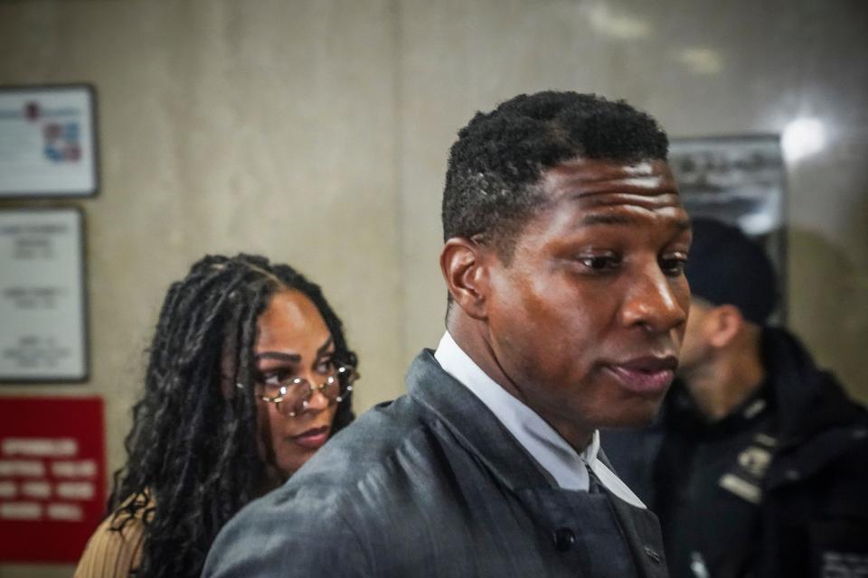 Actor Jonathan Majors arrives at court with Meagan Good.