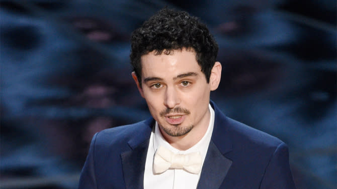 Damien Chazelle accepts the award for best director for “La La Land” at the Oscars on Sunday, Feb. 26, 2017, at the Dolby Theatre in Los Angeles. (Photo by Chris Pizzello/Invision/AP)