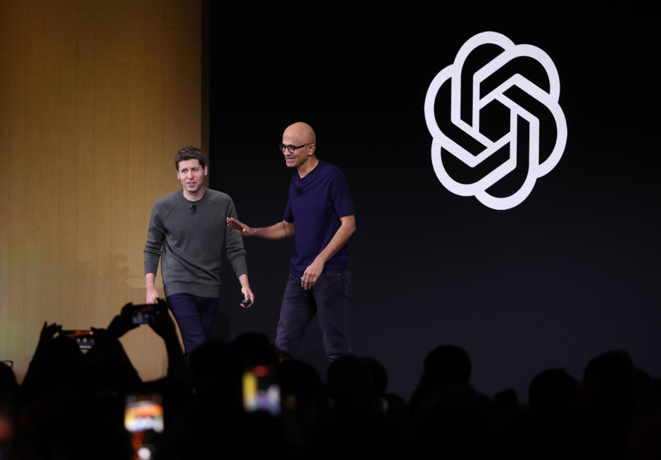 SAN FRANCISCO, CALIFORNIA - NOVEMBER 06: Microsoft CEO Satya Nadella (R) greets OpenAI CEO Sam Altman during the OpenAI DevDay event on November 06, 2023 in San Francisco, California. Altman delivered the keynote address at the first-ever Open AI DevDay conference. (Photo by Justin Sullivan/Getty Images)