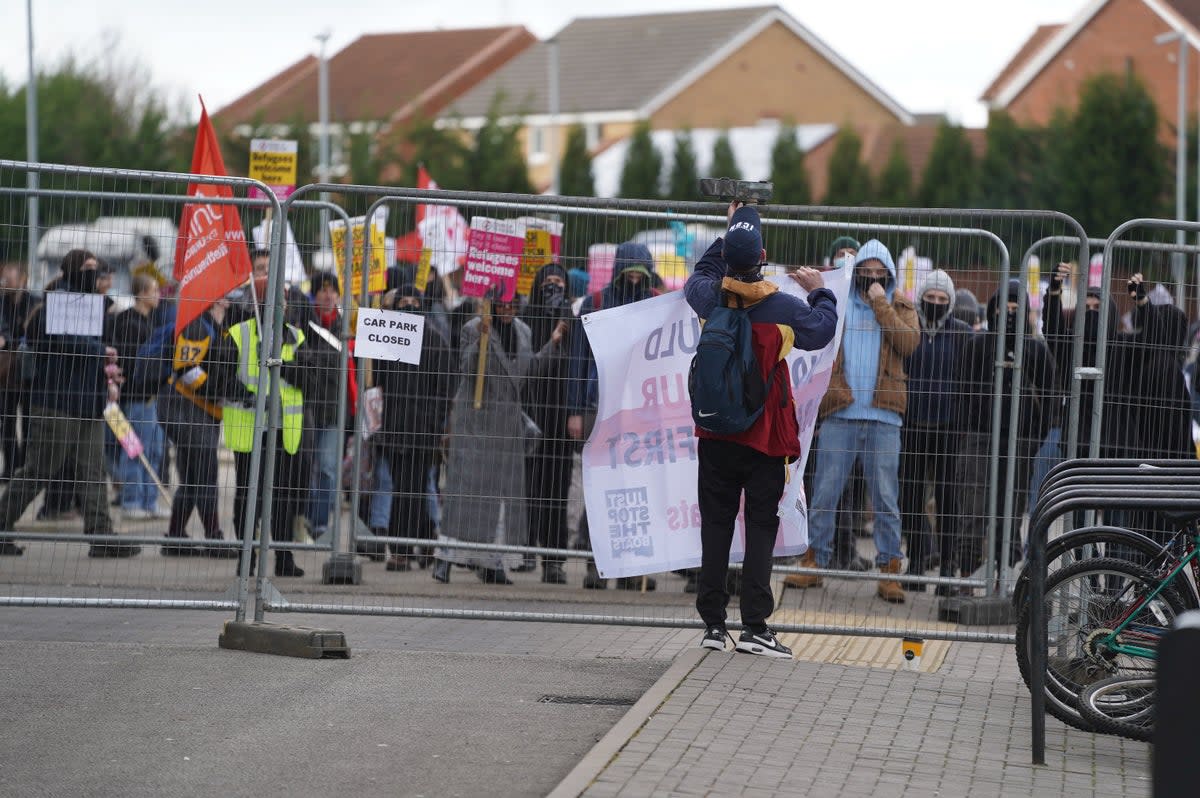 Protesters outside a Holiday Inn, Rotherham (Tom Maddick /  SWNS)