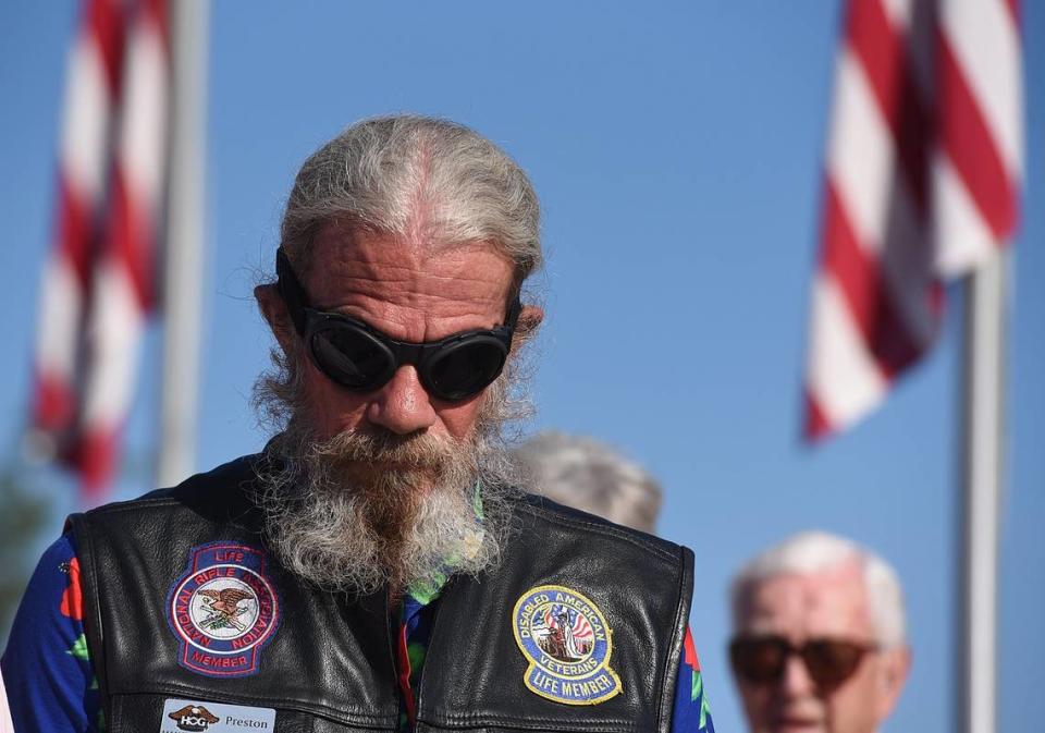 Veteran Preston Huse bows his head for the invocation at the Memorial Day 2016 service held at the Veteran’s Monument in Bradenton.