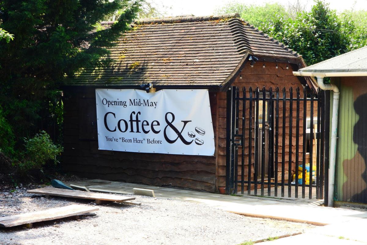 Coffee & sign outside the former Bean Here location. <i>(Image: Stephen Danzig)</i>