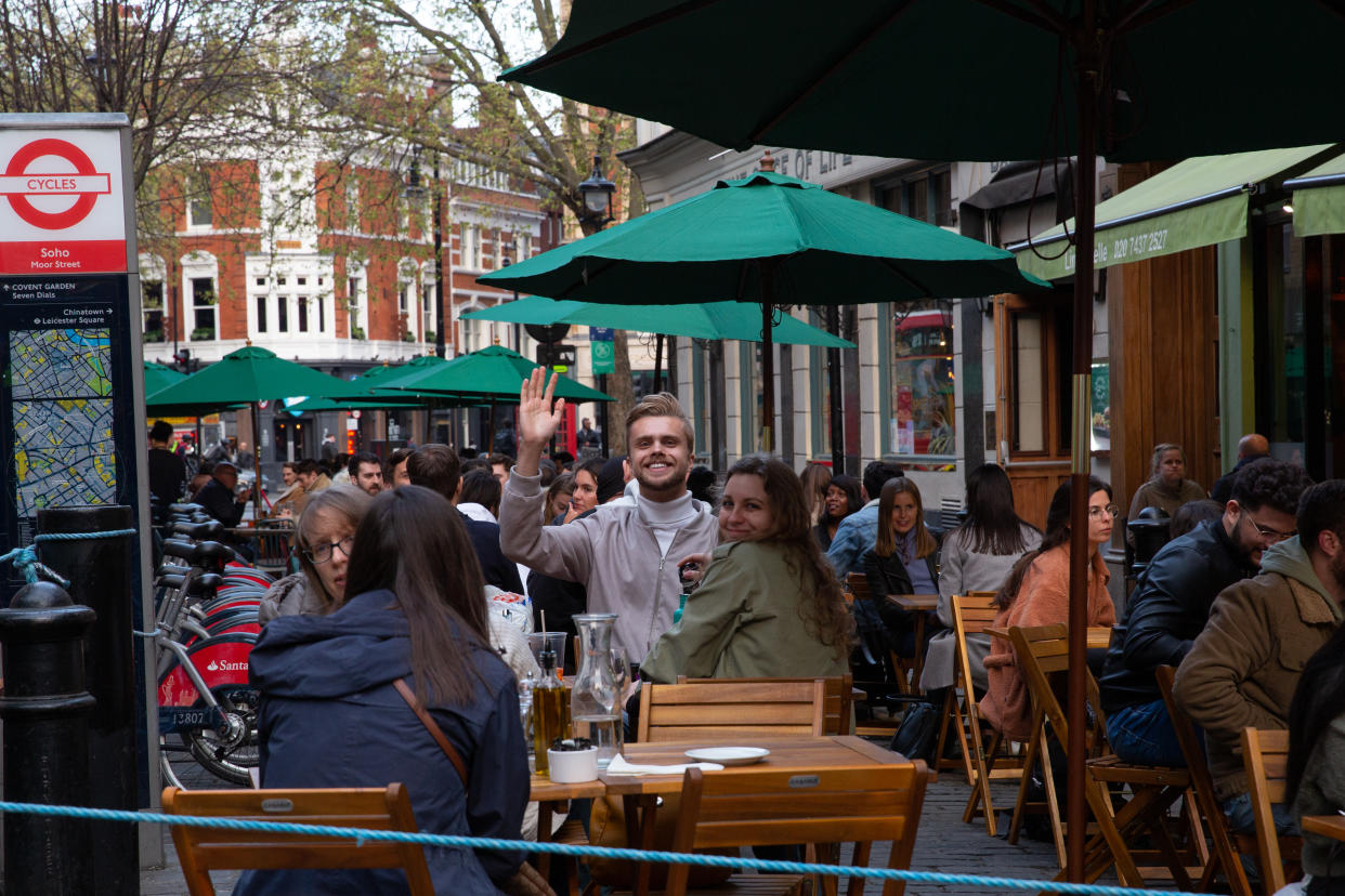 Londoners enjoy outdoor restaurants and pubs in landmark Soho district of central London as Coronavirus restrictions start to ease and the economy start to pick up in London, England on April 27, 2021. The Prime Minister Boris Johnson has set a road map on easing the restrictions. English bar and restaurants can host people in their outdoors facilities.