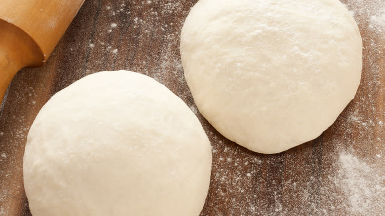 Pizza dough balls rising