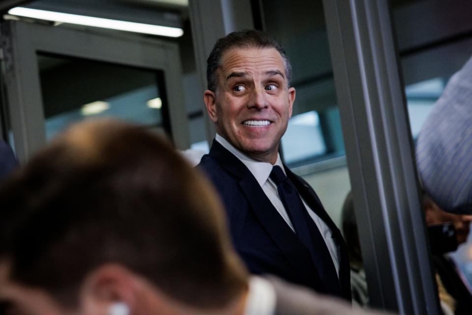 Hunter Biden, son of U.S. President Joe Biden, leaves with his attorney Abbe Lowell following a closed-door deposition before the House Committee on Oversight and Accountability, and House Judiciary Committee in the O'Neill House Office Building on February 28, 2024 in Washington, DC. The meeting is part of the Republicans' impeachment inquiry into President Joe Biden.