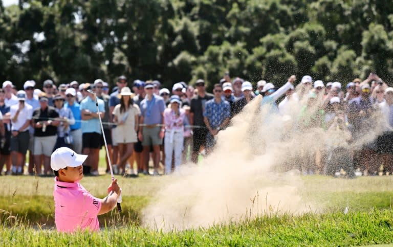 Tom Kim of South Korea plays from a bunker on the 15th hole in the third round of the 123rd US Open at Los Angeles Country Club (ROSS KINNAIRD)