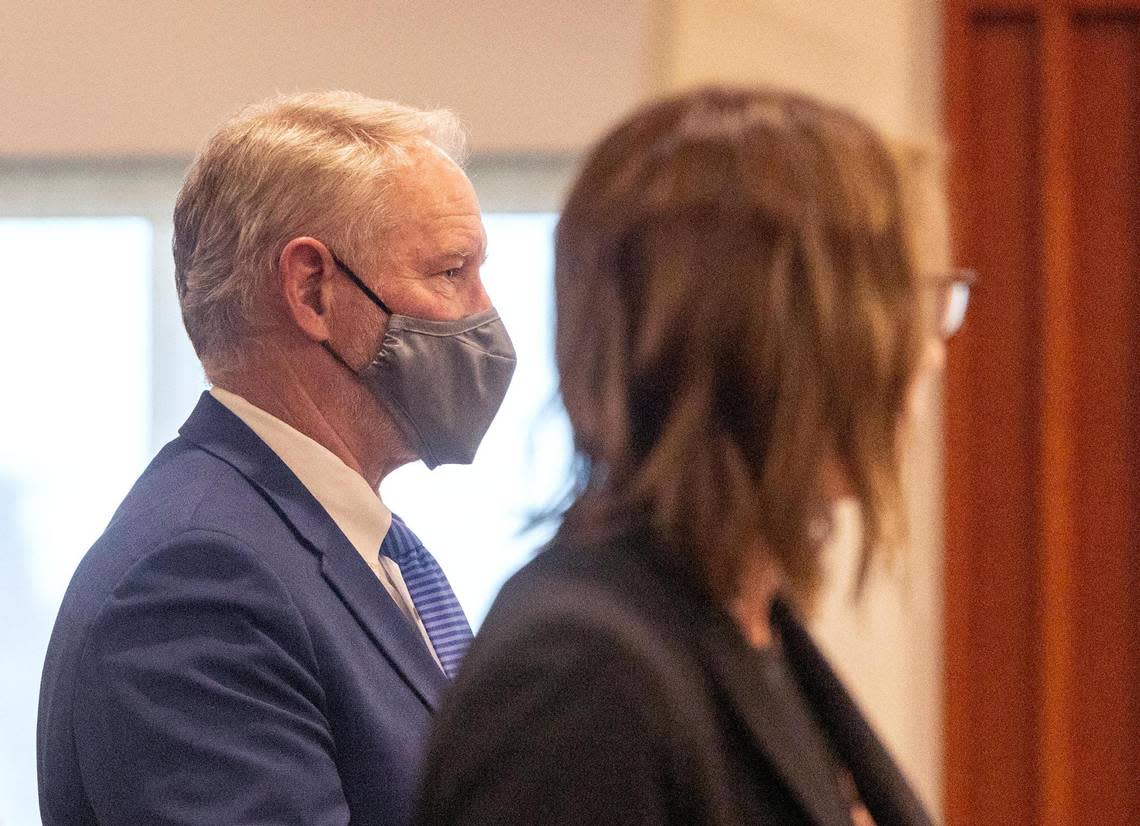 Defense attorney Attorney Jon Cox, left, and Ada County Deputy Prosecutor Katelyn Margueritte Farley stand during the sentencing of former Republican state Rep. Aaron von Ehlinger.