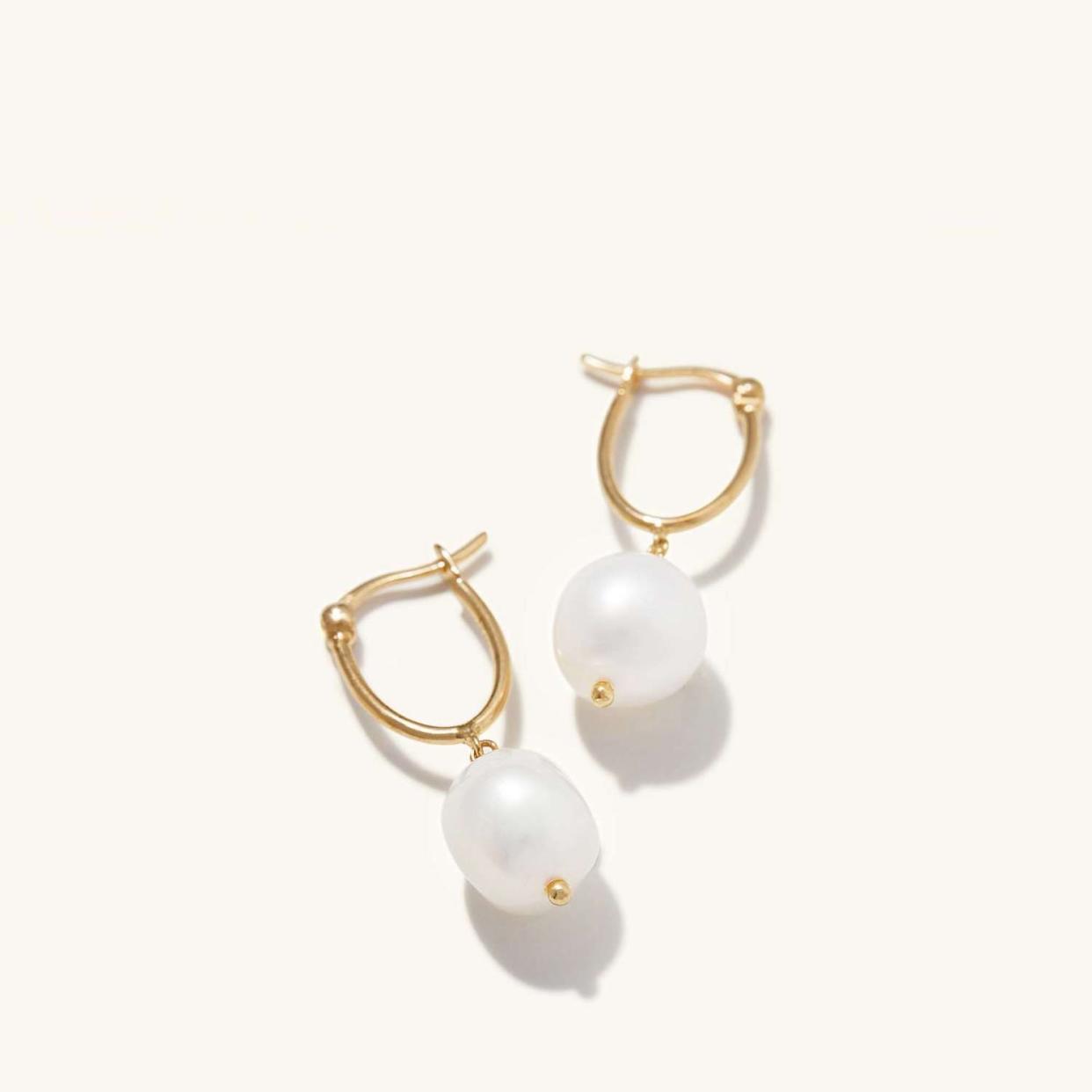 <p><a href="https://go.redirectingat.com?id=74968X1596630&url=https%3A%2F%2Fmejuri.com%2Fshop%2Fproducts%2Forganic-pearl-hoops&sref=https%3A%2F%2Fwww.cosmopolitan.com%2Fstyle-beauty%2Ffashion%2Fg26765913%2Fgifts-for-mom-from-daughter%2F" rel="nofollow noopener" target="_blank" data-ylk="slk:Shop Now;elm:context_link;itc:0;sec:content-canvas" class="link rapid-noclick-resp">Shop Now</a></p><p>Organic Pearl Hoops </p><p>mejuri.com</p><p>$78.00</p>