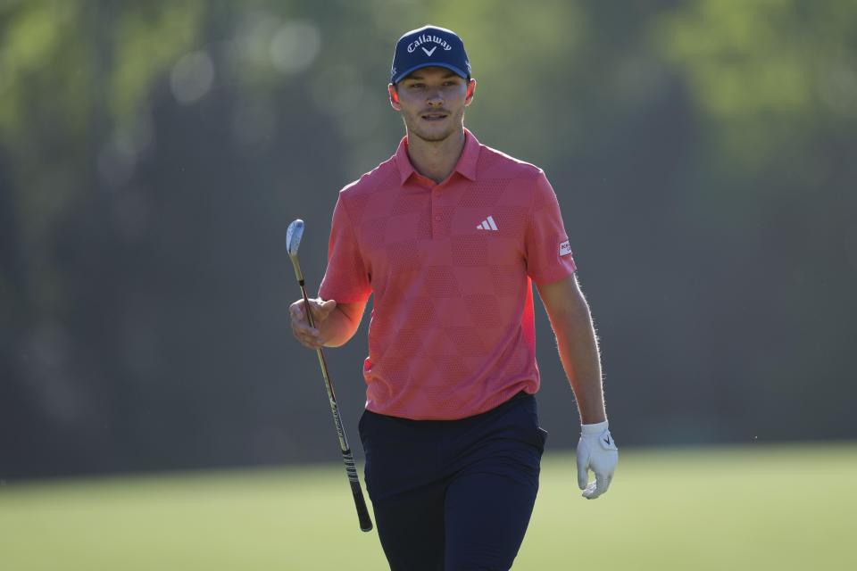 Nicolai Hojgaard, of Denmark, arrives at the 14th green during third round at the Masters golf tournament at Augusta National Golf Club Saturday, April 13, 2024, in Augusta, Ga. (AP Photo/Ashley Landis)