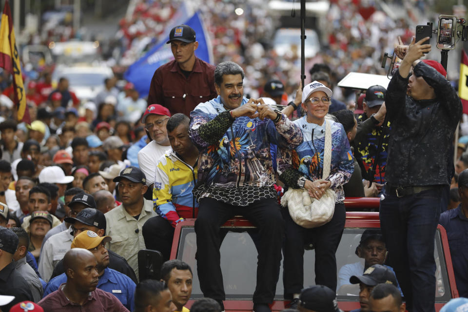 President Nicolas Maduro gestures to the crowd during a rally launching the official presidential campaign season, in Caracas, Venezuela, Thursday, July 4, 2024. Venezuelans head to the polls on July 28 as Maduro seeks a third term. (AP Photo/Cristian Hernandez)