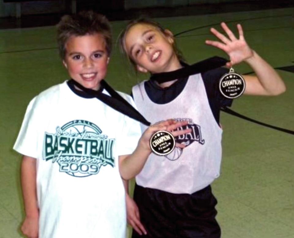 Oklahoma State guard Rylee Langerman is pictured with her twin brother, Ryan, celebrating a medal they won as children.