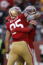 San Francisco 49ers wide receiver Jauan Jennings, right, is congratulated by tight end George Kittle (85) after catching a touchdown pass during the first half of an NFL football game against the New Orleans Saints in Santa Clara, Calif., Sunday, Nov. 27, 2022. (AP Photo/Jed Jacobsohn)