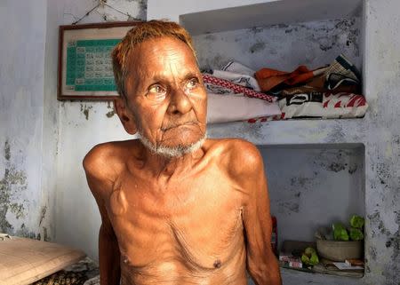 Mohammad Hashim Ansari, the oldest litigant in a case seeking to preserve Muslim claim on a disputed religious site, sits inside his house at a Muslim neighbourhood in Ayodhya in the northern state of Uttar Pradesh, India, June 16, 2016. REUTERS/Tom Lasseter