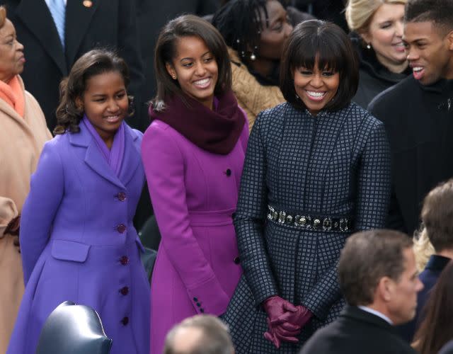 WASHINGTON, DC – JANUARY 21: First lady Michelle Obama and daughters, Sasha Obama and Malia Obama arrive during the presidential inauguration on the West Front of the U.S. Capitol January 21, 2013 in Washington, DC. Barack Obama was re-elected for a second term as President of the United States. (Photo by Mark Wilson/Getty Images)