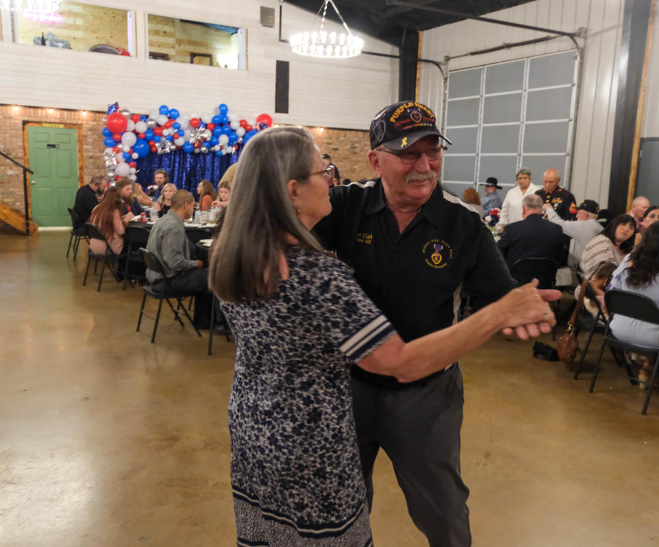 A Purple Heart veteran shares a dance with his partner May 18 at the BOOM Adventures Armed Forces Day Banquet in Amarillo.
