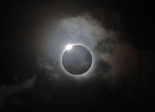 The Diamond Ring effect is shown following the solar eclipse as seen at Palm Cove in Australia's north Queensland. Queensland was one of the few places it could be viewed by people and as a result thousands of tourists and scientists gathered to witness the region's first total solar eclipse in 1,300 years