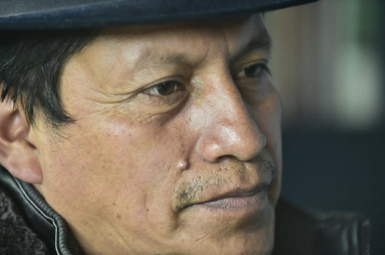 Quechua Indian Gustavo Negrete, evangelical pastor of the Llamahuasi community in Ecuador, speaks during an interview with AFP at his home in Pujili on June 28, 2015