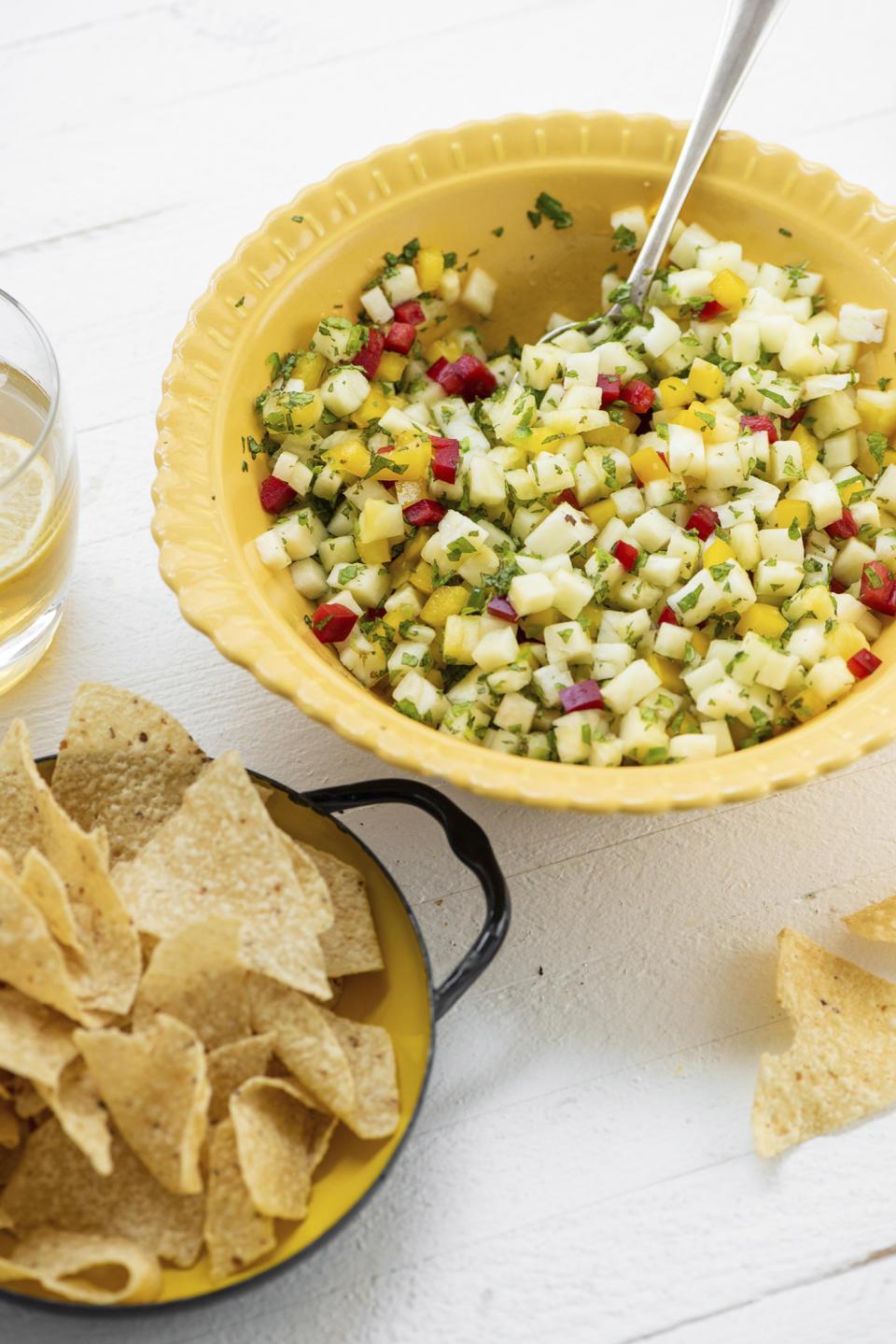 This image shows a recipe for pineapple mint jalapeno salsa. While everyone loves a classic tomato-based salsa, you can shake things up with different fruit-based salsas. (Cheyenne Cohen via AP)