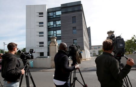 FILE PHOTO: Members of the media wait outside Sebastopol Hospital in Reims