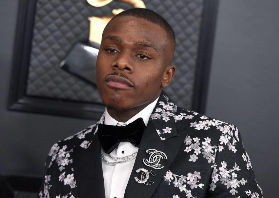 Charlotte rapper DaBaby, shown at the 2020 Grammy Awards in Los Angeles, and some of his associates are accused of beating and robbing a vacation rental home owner near Hollywood Hills, Calif., and breaking COVID-19 crowding rules to boot, a lawsuit said.