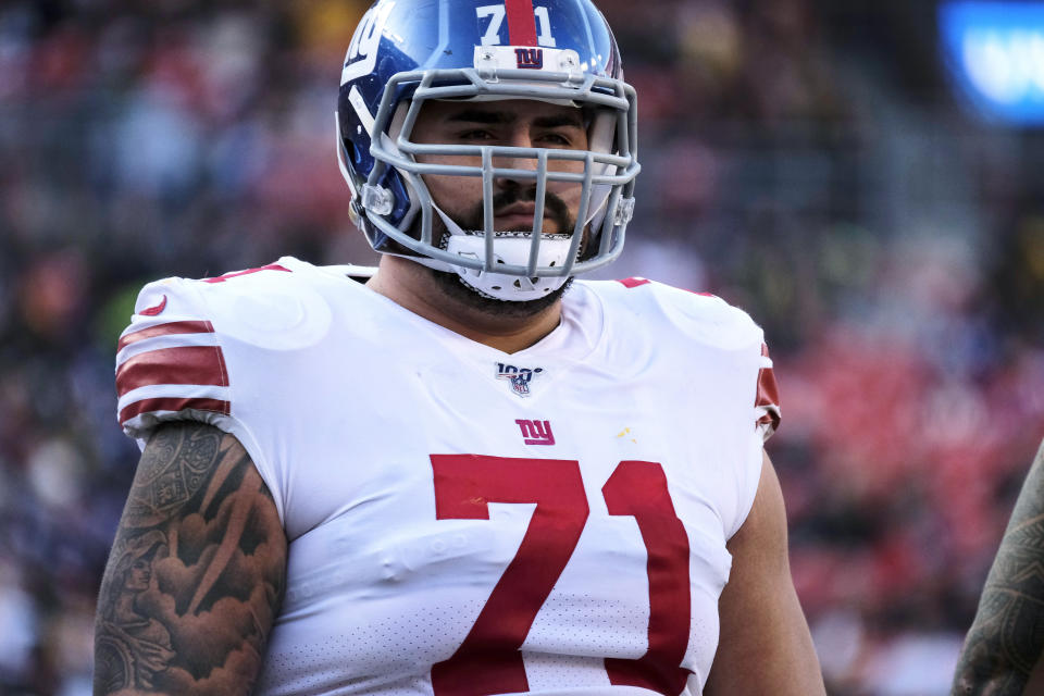 FILE - In this Dec. 22, 2019, file photo, New York Giants offensive guard Will Hernandez stands on the field during the team's NFL football game against the Washington Redskins in Landover, Md. Hernandez, who has started every game since being draft in 2018, was placed on the reserve COVID-19 list on Thursday, Oct. 29, after testing positive for the virus. (AP Photo/Mark Tenally, File)