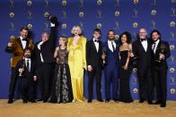 <p>The <em>Game of Thrones</em> cast celebrates their win for Outstanding Drama Series. The HBO fantasy series garnered a record-breaking 32 nominations for its final season in 2019. Peter Dinklage also collected a trophy for Outstanding Supporting Actor in the series. </p>