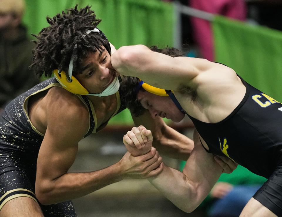 Warren Central Brenton Russell wrestles Carmel Nathan Powell during the IHSAA wrestling semi-state on Saturday, Feb. 11, 2023 at New Castle Fieldhouse in New Castle.