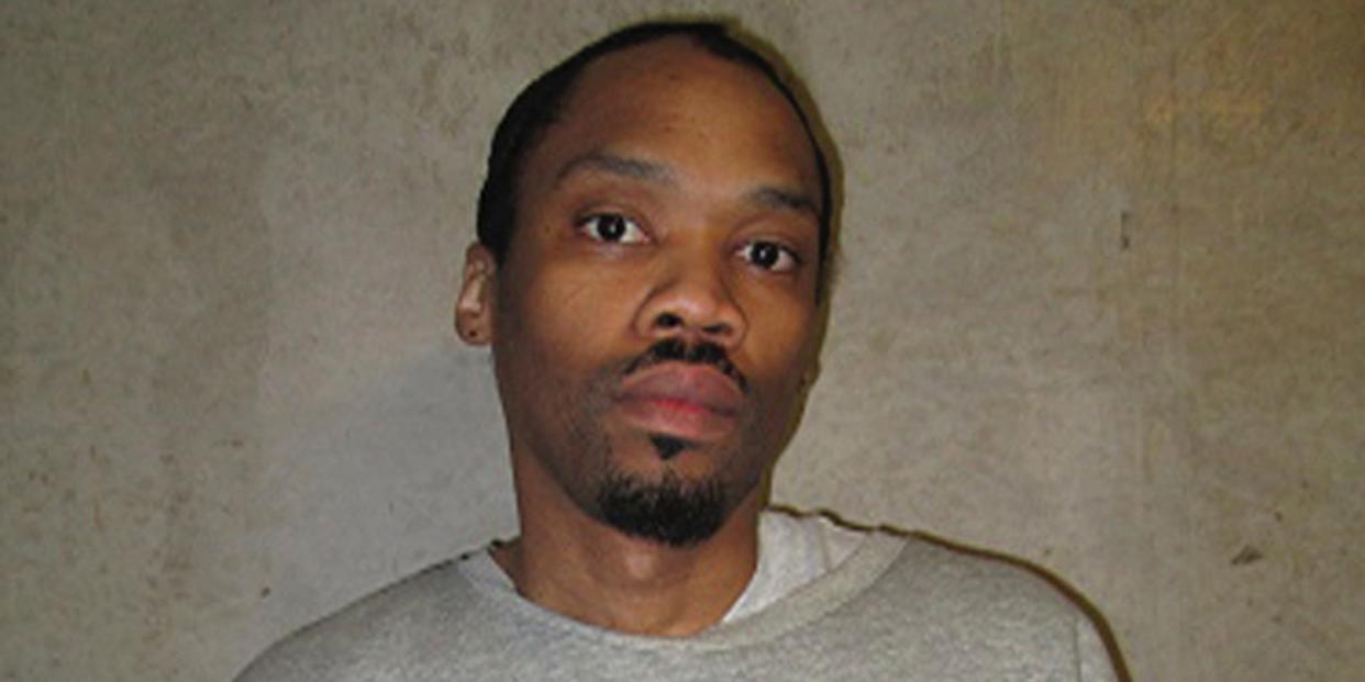 This undated file photo released by Oklahoma Department of Corrections shows Julius Jones. Oklahoma County's top prosecutor is asking the state's Pardon and Parole Board to reject a commutation request from Jones. Jones' case has drawn national attention and he's scheduled for a commutation hearing next week. Jones was convicted and sentenced to die for the 1999 shooting death of Edmond businessman Paul Howell.