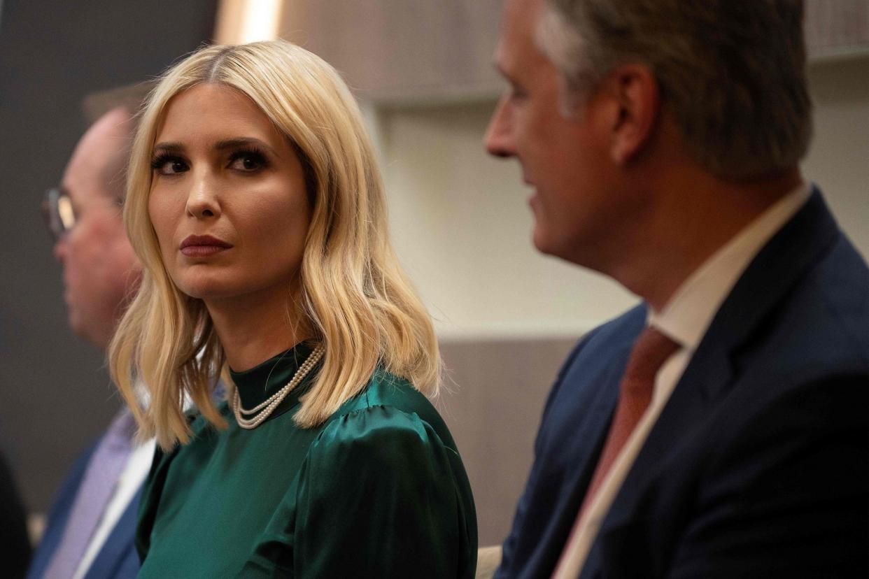 Ivanka Trump looks on while her father speaks at the World Economic Forum in Davos: AFP via Getty Images