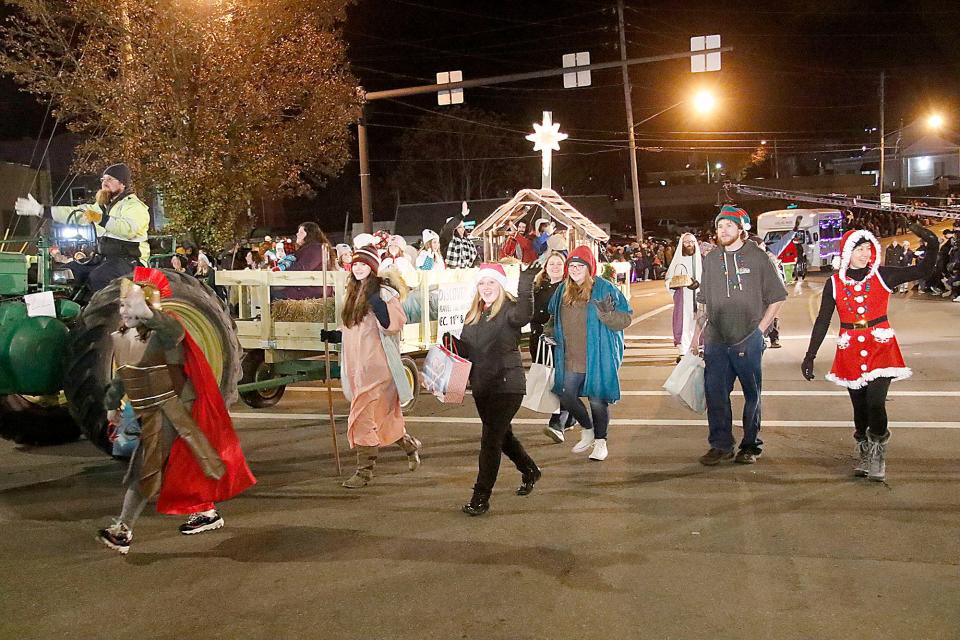 New Life Community Church's entry is seen in Ashland's 2021 Christmas parade is seen heading down Claremont Avenue at West Main Street on Saturday, Dec. 4, 2021. TOM E. PUSKAR/TIMES-GAZETTE.COM