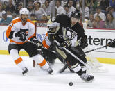 PITTSBURGH, PA - APRIL 20: James Neal #18 of the Pittsburgh Penguins handles the puck against Andreas Lilja #6 of the Philadelphia Flyers in Game Five of the Eastern Conference Quarterfinals during the 2012 NHL Stanley Cup Playoffs at Consol Energy Center on April 20, 2012 in Pittsburgh, Pennsylvania. (Photo by Justin K. Aller/Getty Images)