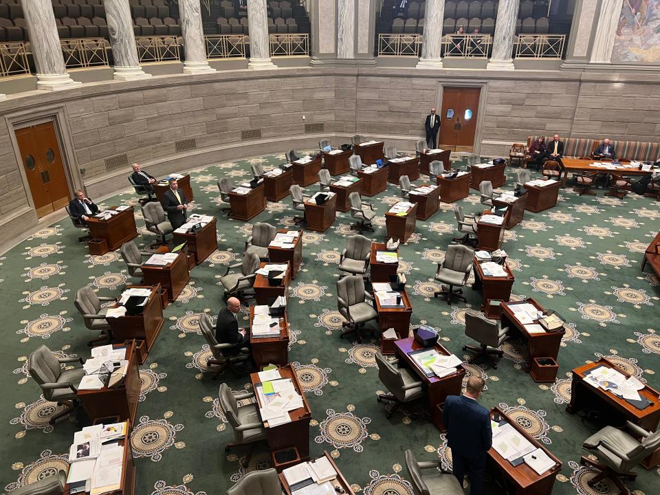 Members speak on the Missouri Senate floor in 2021.