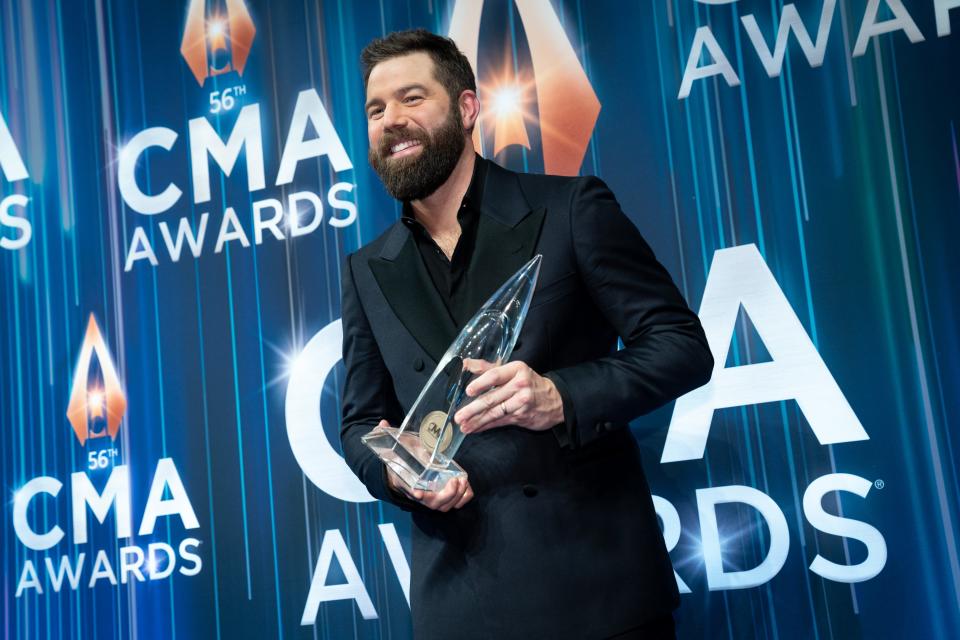 Jordan Davis poses with his award for Song of the Year in the media center during the 56th CMA Awards at Bridgestone Arena in Nashville, Tenn., Wednesday, Nov. 9, 2022.