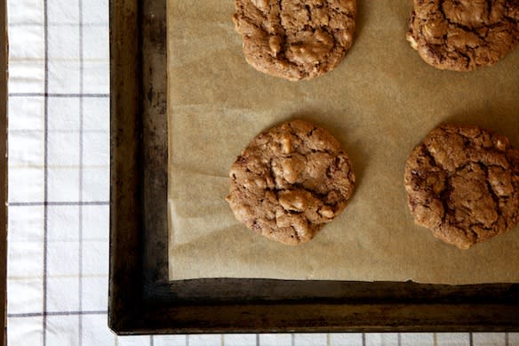 <div class="caption-credit"> Photo by: James Ransom</div><div class="caption-title">Chocolate Oatmeal Cookies</div><b><a rel="nofollow noopener" href="http://food52.com/recipes/14475-chocolate-oatmeal-cookies" target="_blank" data-ylk="slk:Save and print this recipe on Food52;elm:context_link;itc:0;sec:content-canvas" class="link ">Save and print this recipe on Food52</a></b>. <br> <br> <i>Makes about 60 cookies</i> <br> <br> 1 1/2 cup all-purpose flour <br> 1/4 cup cocoa powder <br> 1 tsp. baking soda <br> 1 tsp. salt <br> 1 cup vegetable shortening <br> 1 cup each sugar & packed light brown sugar <br> 2 large eggs <br> 1 tsp. vanilla extract <br> 1 cup rolled oats <br> 1 cup coarsely chopped dark chocolate <br> 1 cup chopped toasted walnuts <br> <br> 1. Heat oven to 350 degrees. Line 2 baking sheets with parchment paper. Sift together flour, cocoa, baking soda & salt. <br> 2. Beat shortening & sugars in a large bowl. Beat in eggs & vanilla. Mix in oats & chocolate. Stir in flour mixture & nuts. <br> 3. Drop dough by tablespoonful onto baking sheets, 1 1/2 inches apart. Bake 12 minutes.