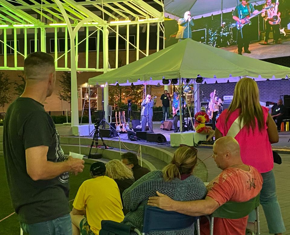 Fans watch Ray Fuller and the Bluesrockers last summer at the Canton Blues Fest in downtown Canton. The event is back this year on June 4 at Centennial Plaza.