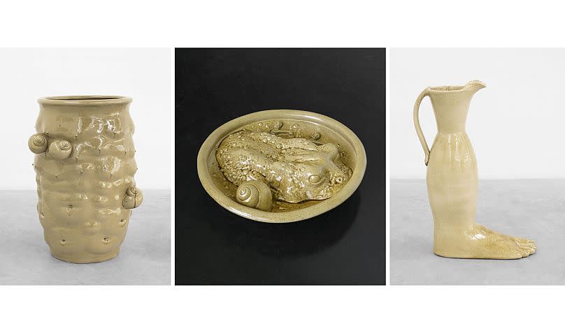 (L to R) "Stoneware jar with body fragments and snails, 2023", "Stoneware dish with toad, snails and taps" and "Stoneware vessel, 2023" by Daniel Dewar and Grégory Gicquel.