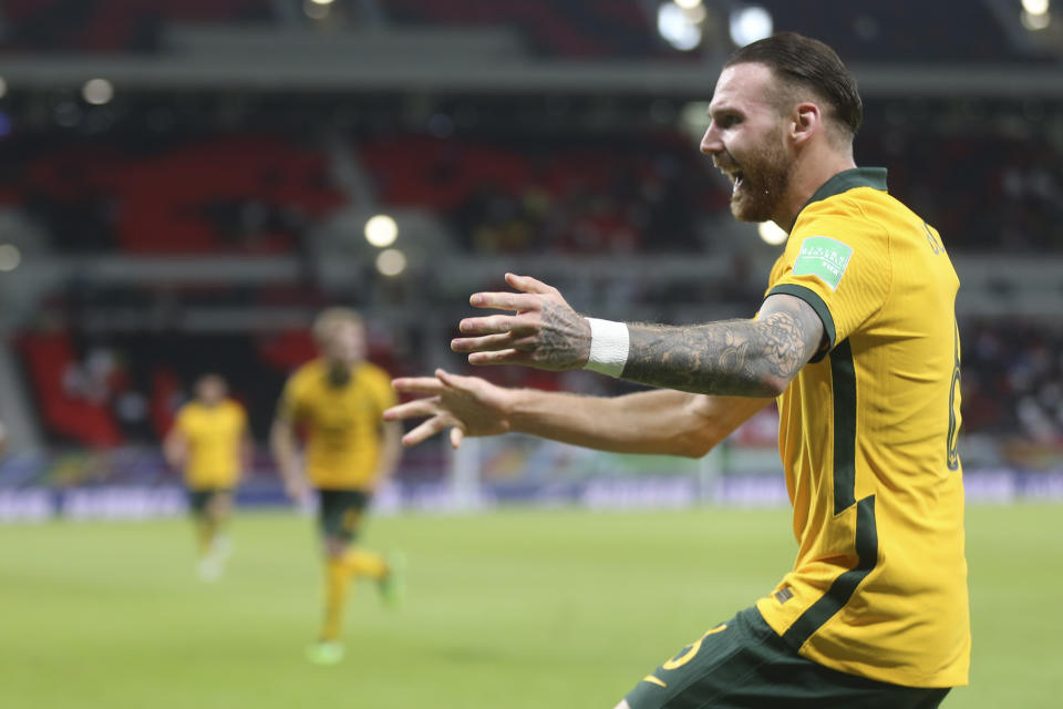 Australia's Martin Boyle celebrates after a goal during a qualifying match between United Arab Emirates and Australia in Al Rayyan, Qatar, Tuesday, June 7 2022. (AP Photo/Hussein Sayed)