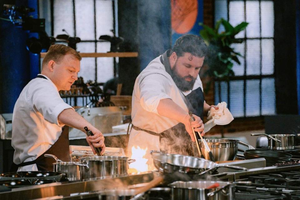 Newark chef Robbie Jester, right, is shown cooking on "Pressure Cooker," the Netflix cooking competition series that drops Jan. 6.