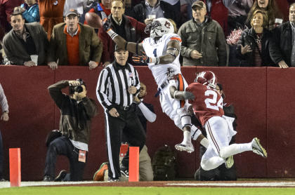 Alabama defensive back Geno Smith (24) defends as Auburn wide receiver D&#39;haquille Williams (1) can&#39;t catch the pass during the first quarter of an NCAA college football game Saturday, Nov. 29, 2014, at Bryant-Denny Stadium in Tuscaloosa, Ala. (AP Photo/AL.com, Vasha Hunt)