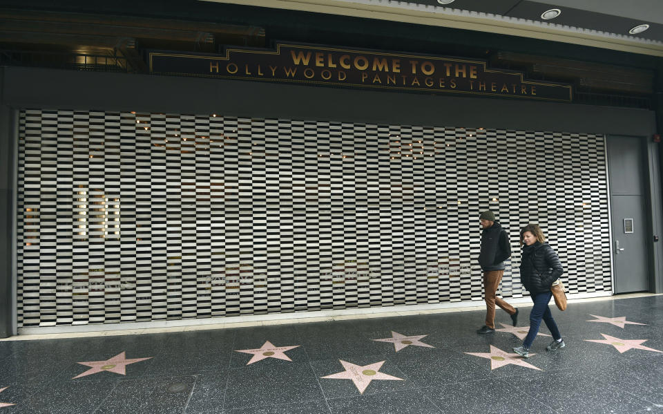 Image: Los Angeles pedestrians (Chris Pizzello / AP)